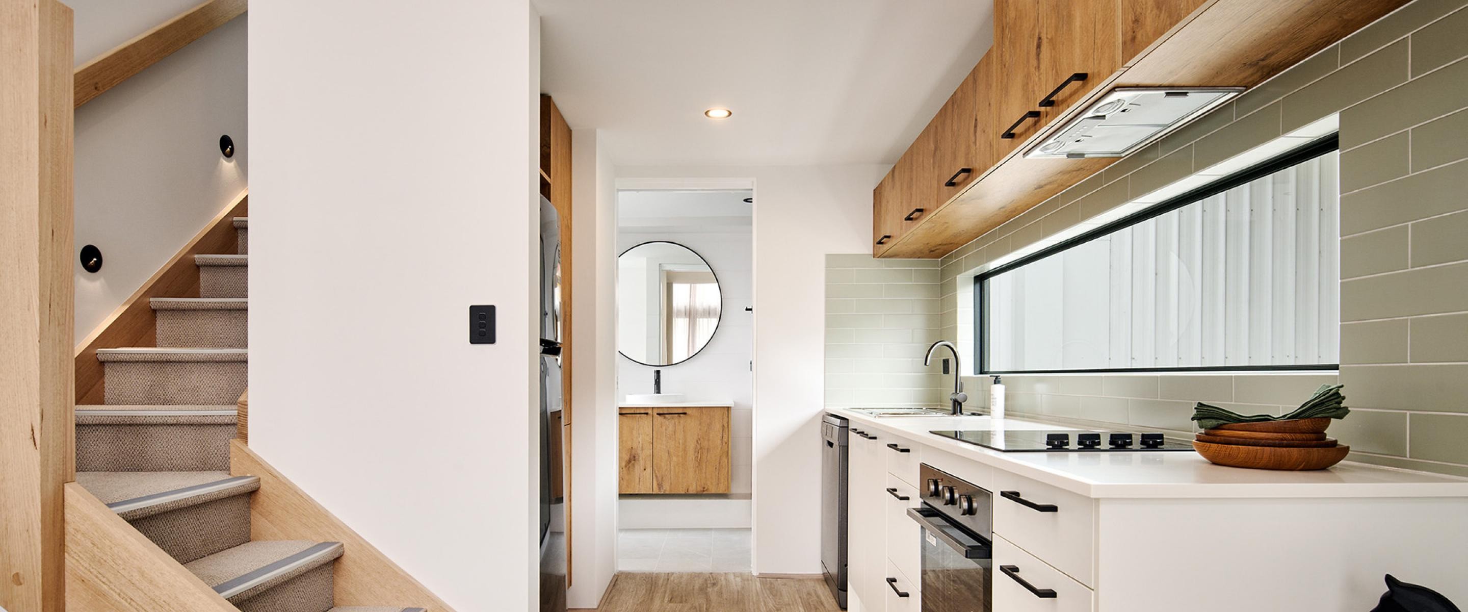 Tiny home by Summit Modular. Kitchen and stairs