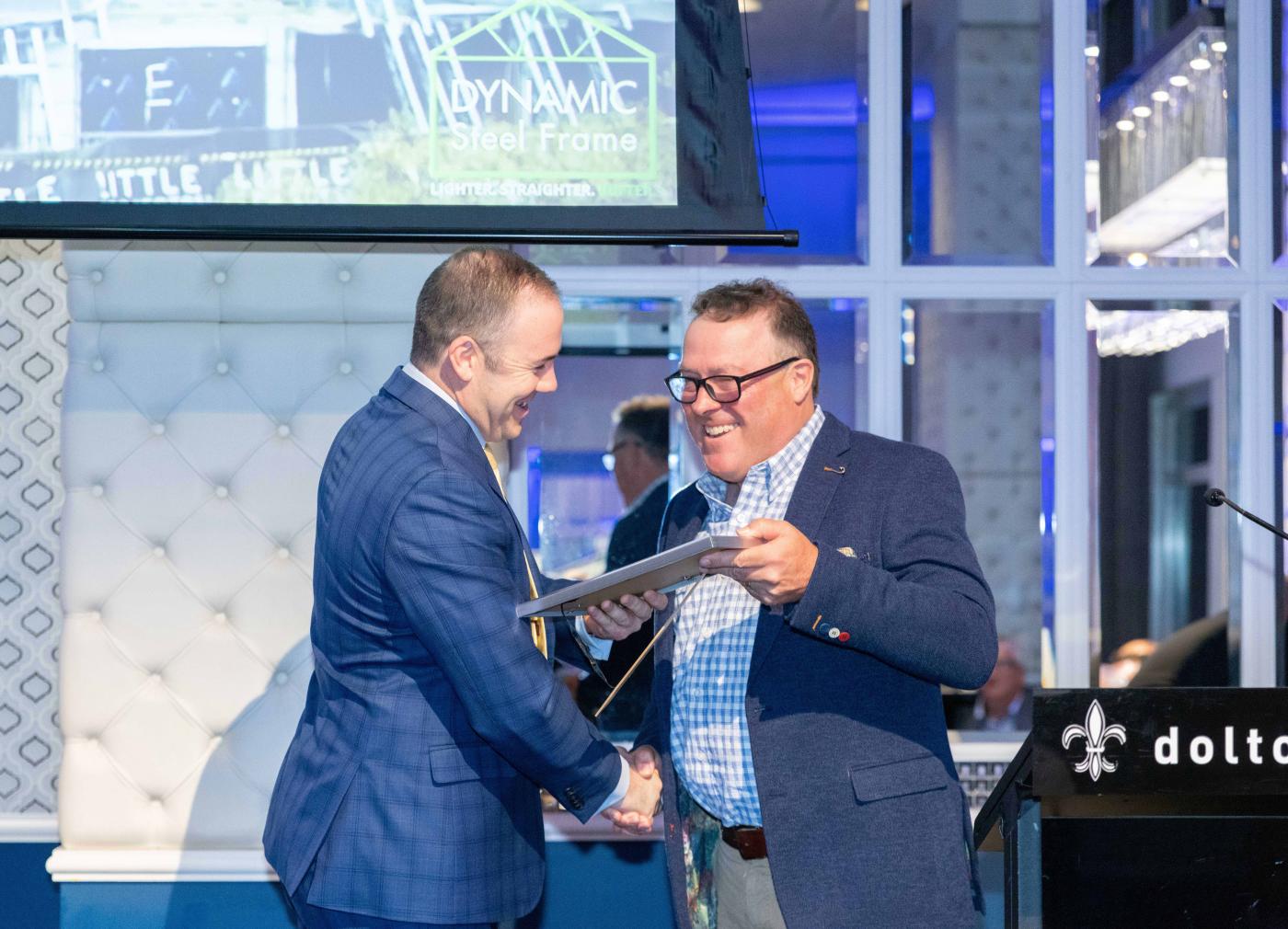 Pictured are the winners of the awards for Innovative Cold Form Steel Buildings. Dynamic Steel Frame, for the Grattan Street Facade. Peter Blythe, Managing Director at Dynamic Steel Frame. With John Shayler, National President, NASH.